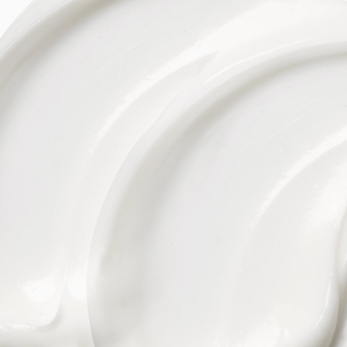 A close up of Firming Neck Cream rich texture,